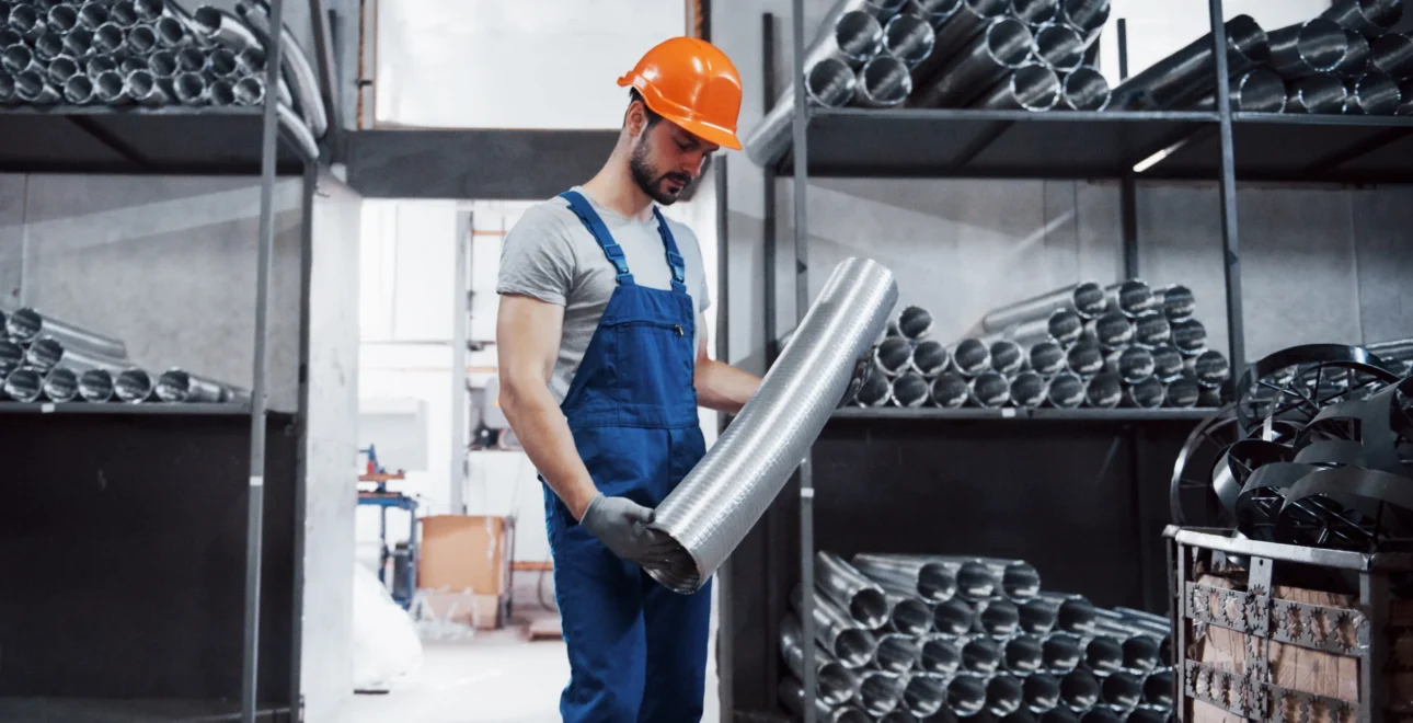 portrait-young-worker-hard-hat-large-metalworking-plant